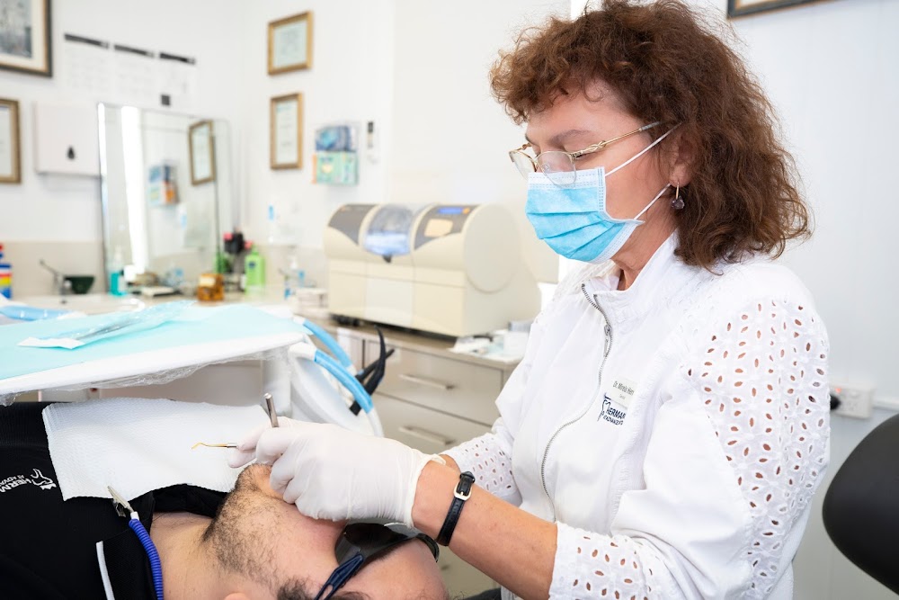 Tooth Extraction by Herman